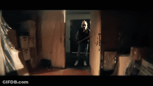 Man Holding Baseball Bat GIF