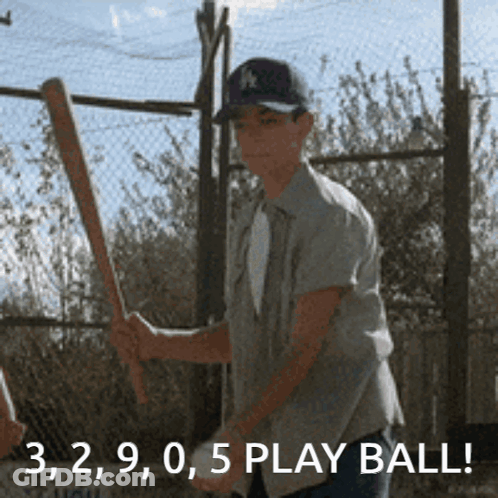 Man Holding Baseball Bat With Number 3 GIF