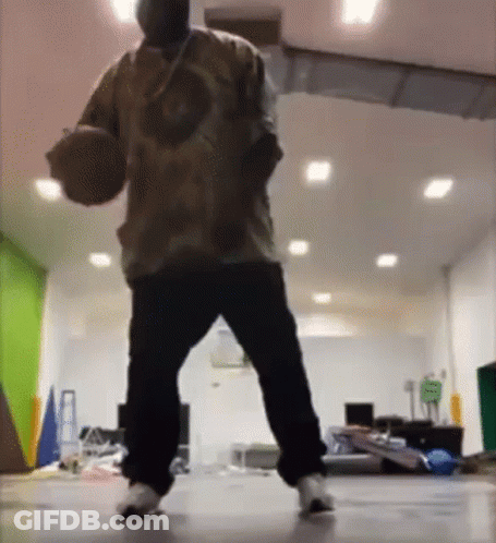 Man Holding Basketball GIF