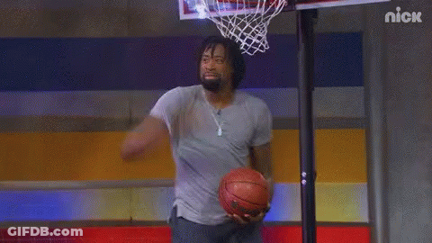 Man Holding Basketball In Front Of Nick Hoop GIF