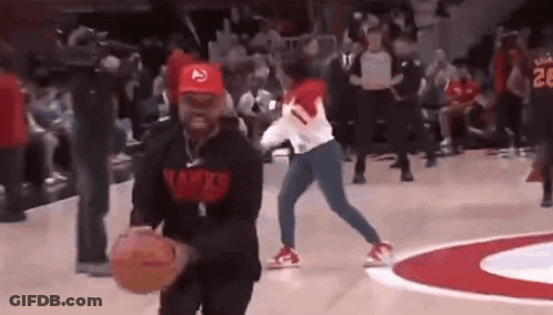 Man Holding Basketball Woman Defending GIF