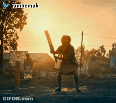 Man Holding Bat In Front Of Iamhemuk Sign GIF