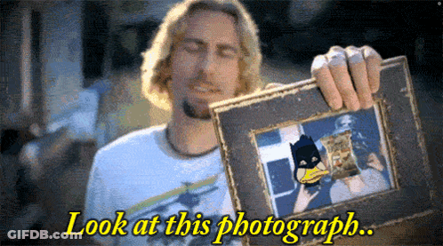 Man Holding Batman Duck Photo Saying Look At This Photograph GIF