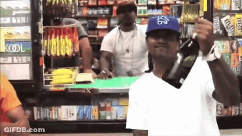 Man Holding Beer In Front Of Kool Cooler GIF