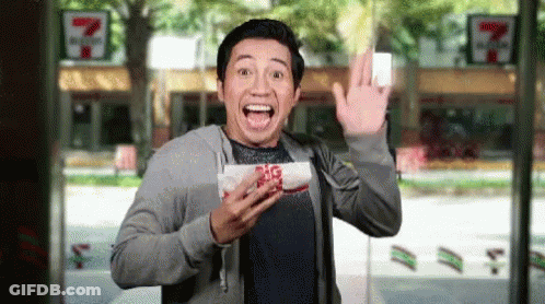 Man Holding Big Mac At 7-Eleven GIF