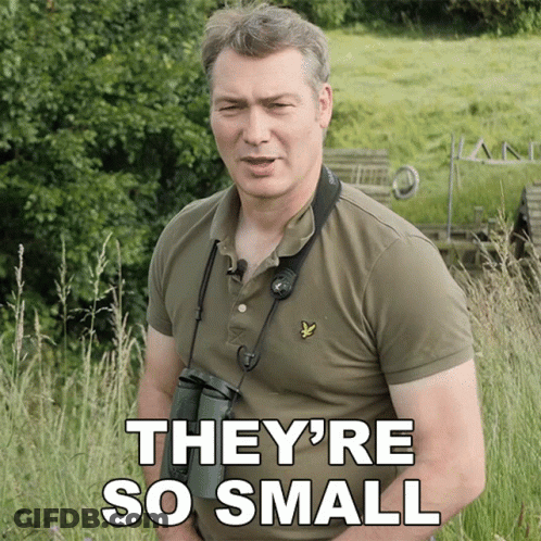 Man Holding Binoculars Saying They're So Small GIF