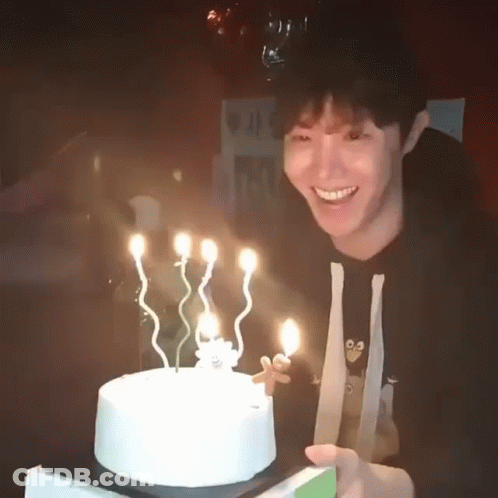 Man Holding Birthday Cake Smiling GIF
