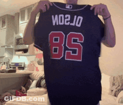 Man Holding Black Jersey Number 85 GIF