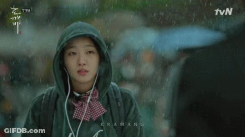 Man Holding Black Umbrella With TVN GIF