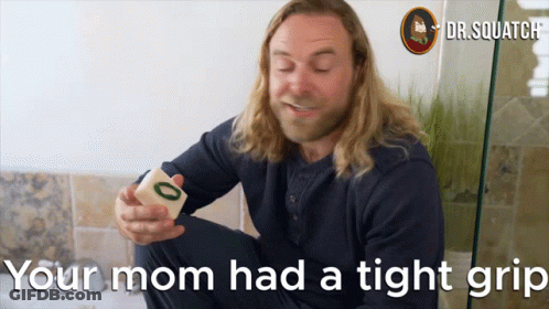 Man Holding Block Saying Your Mom Had A Tight Grip GIF