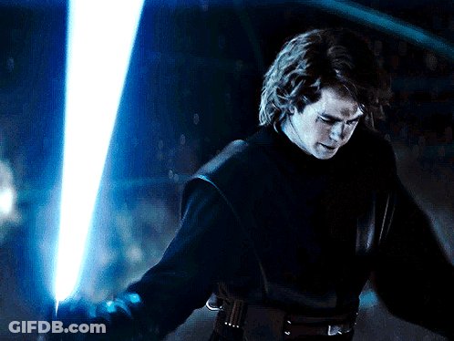 Man Holding Blue Lightsaber GIF