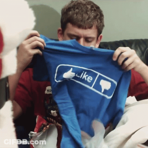 Man Holding Blue Shirt Saying Like GIF