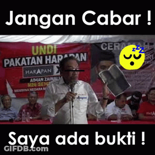 Man Holding Book At Microphone Saying Jangan Cabar Saya Ada Bukti GIF