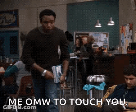 Man Holding Book Saying Me Omw To Touch You GIF