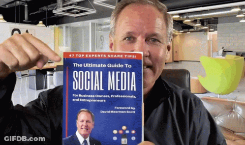 Man Holding Book The Ultimate Guide To Social Media GIF