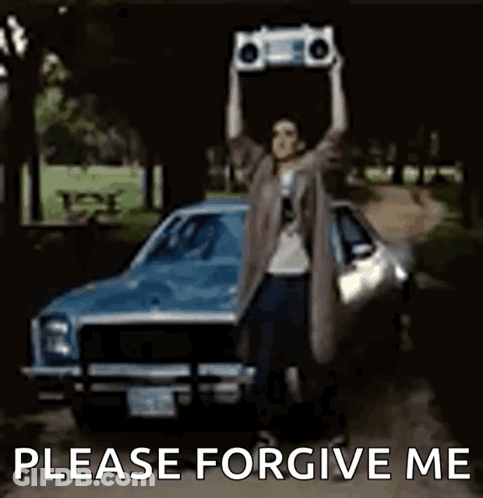 Man Holding Boombox Over Head In Front Of Car Saying Please Forgive Me GIF