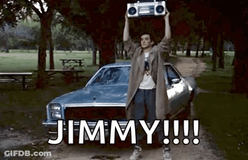 Man Holding Boombox Over Head GIF