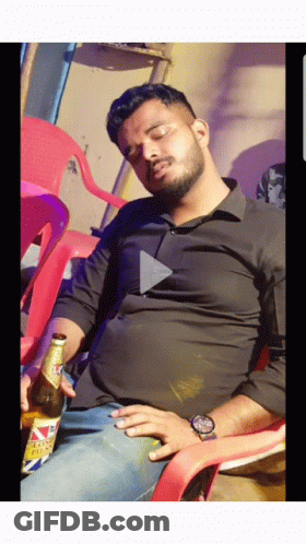 Man Holding Bottle Of British Beer GIF