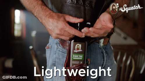Man Holding Bottle Of Pine Tar GIF