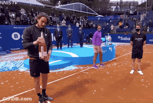 Man Holding Bottle Of Rosana Wine GIF