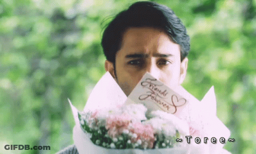 Man Holding Bouquet And Friends Forever Card GIF