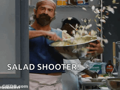 Man Holding Bowl Of Food Salad Shooter GIF