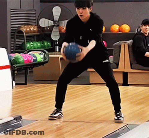 Man Holding Bowling Ball GIF