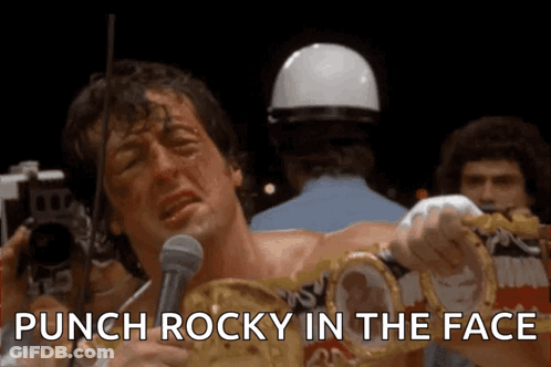 Man Holding Boxing Ring Saying Punch Rocky In The Face GIF