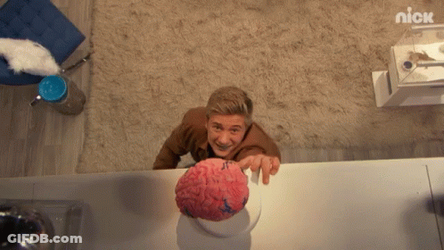 Man Holding Brain Model With Nick Logo GIF
