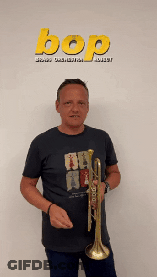 Man Holding Brass Orchestra Instruments Notti Bop GIF