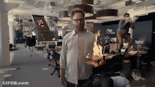 Man Holding Burning Log GIF