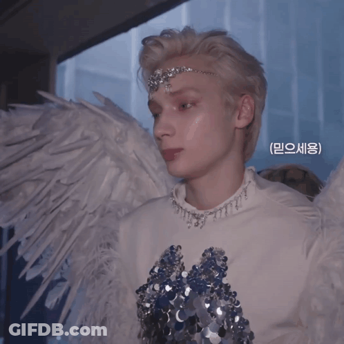 Man Holding Caduceus With Angelica Bovino GIF