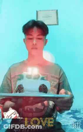 Man Holding Cake Saying Love GIF