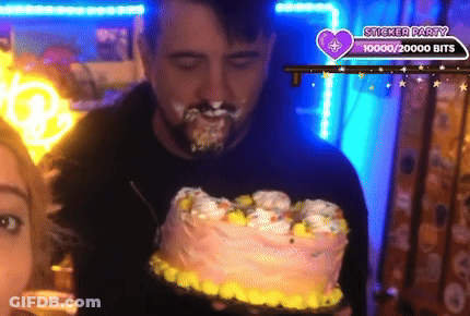 Man Holding Cake With Party Badge GIF