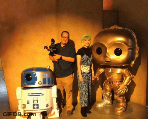 Man Holding Camera Next To R2D2 GIF