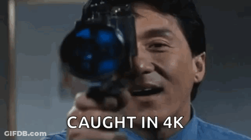 Man Holding Camera Saying Caught In 4K GIF