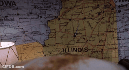 Man Holding Cappuccino In Front Of Illinois Map GIF