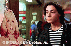 Man Holding Cardboard Cutout Saying Oh Debbie Hi GIF