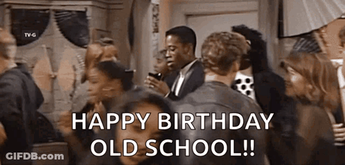 Man Holding Cell Phone In Group GIF