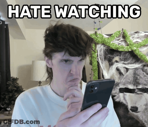 Man Holding Cell Phone Saying Hate Watching GIF