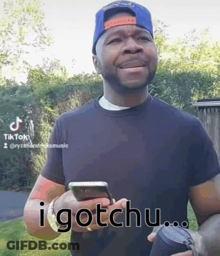 Man Holding Cell Phone Saying I Gotchu GIF
