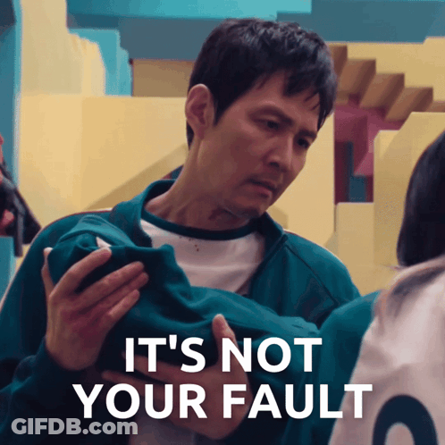 Man Holding Cell Phone Saying It's Not Your Fault GIF