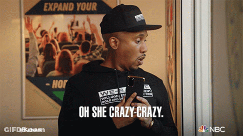 Man Holding Cell Phone Saying Oh She Crazy Crazy GIF