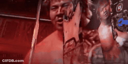Man Holding Champion Sign GIF