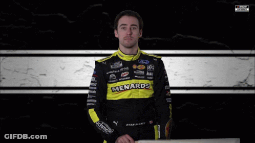 Man Holding Checkered Flag Saying Menards GIF