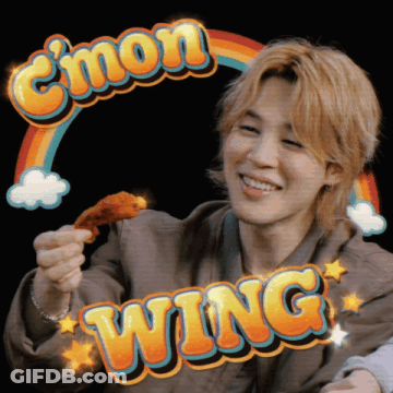 Man Holding Chicken With C'mon Wing Behind Him GIF