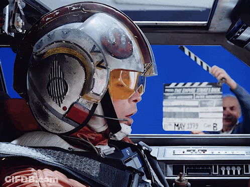 Man Holding Clapper Board May 1979 GIF
