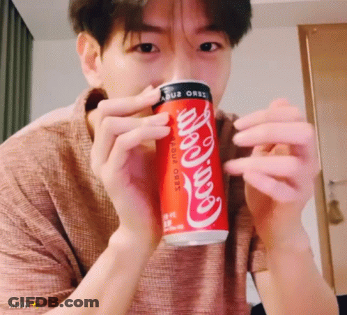 Man Holding Coca Cola Zero Can GIF