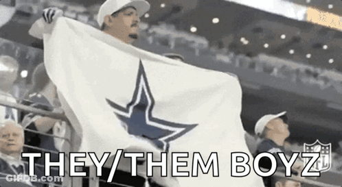 Man Holding Cowboys Flag In Stands GIF