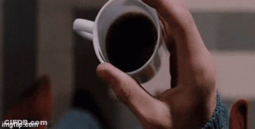 Man Holding Cup Of Coffee GIF